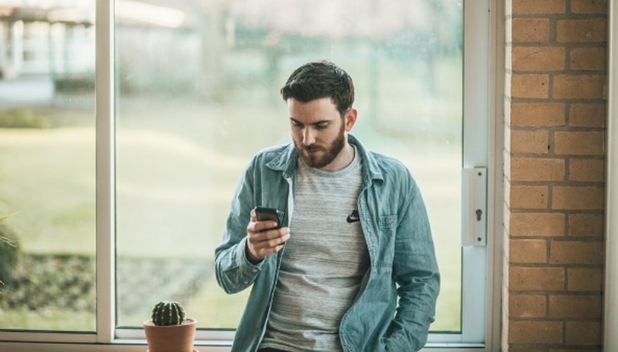 Man using his smartphone.jpg