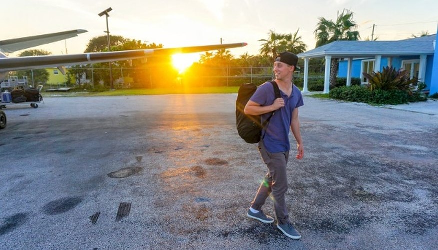 Smiling man walking while looking side view.jpg