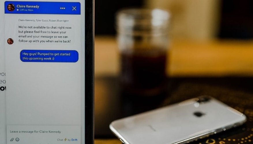 Silver iphone x on brown surface.jpg