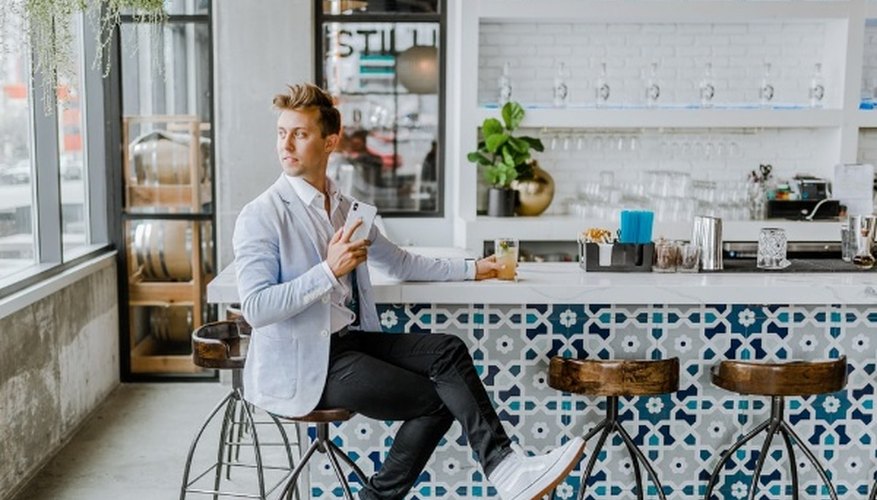 Man sitting on stool.jpg