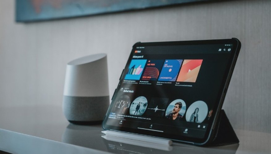 Black tablet computer on white table.jpg