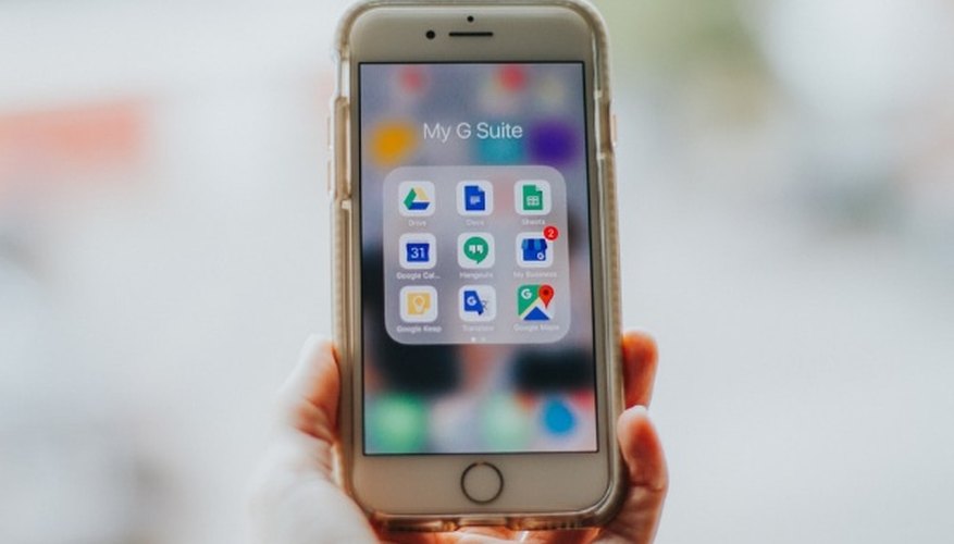Person holding silver iphone 6.jpg