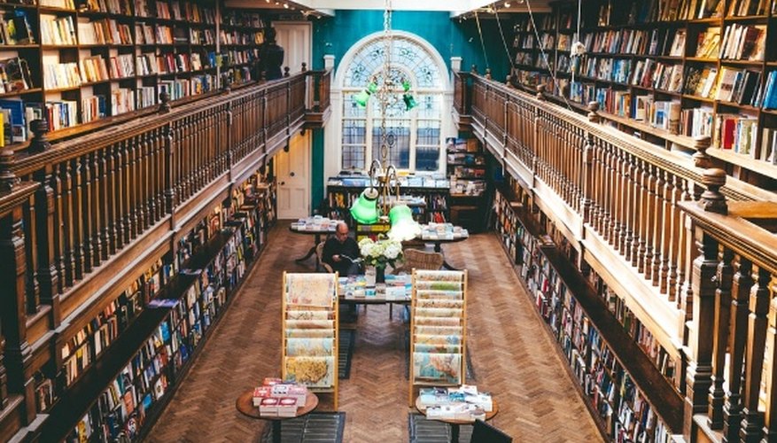 Books arranged on shelves inside library.jpg