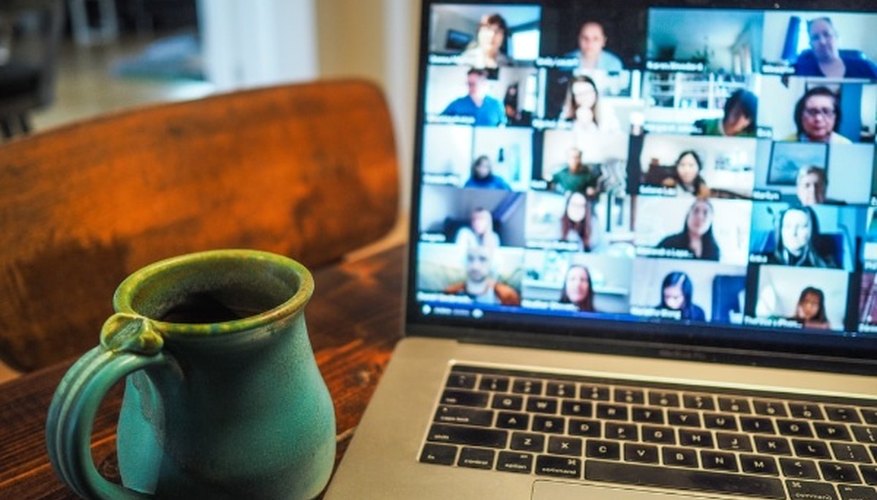 Macbook pro displaying group of people.jpg