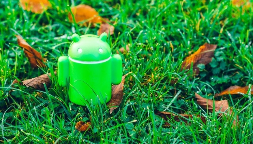 Green android robot toy on grass.jpg