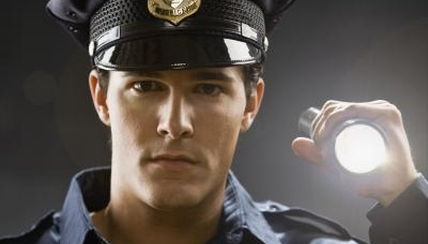 Law enforcement officers set up checkpoints to fight drunk driving.