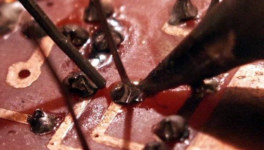 Soldering circuit board. Photo courtesy of Vlastní Dílo