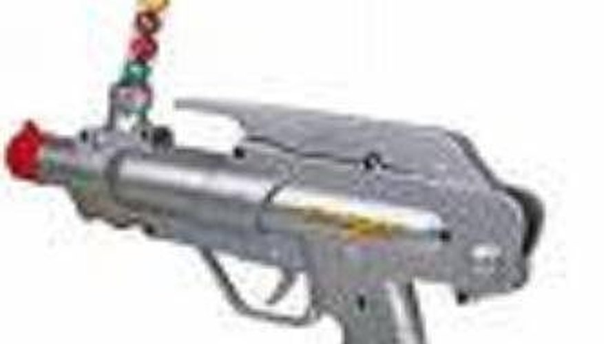 Paintballs loaded into a paintball gun.
