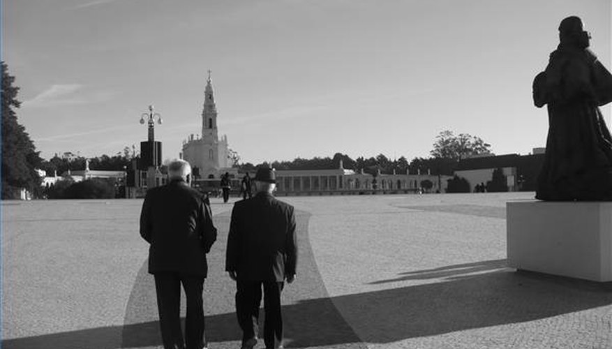 Men walking toward Fatima Cathedral