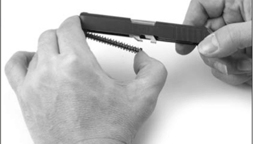 Remove the Recoil Spring Assembly