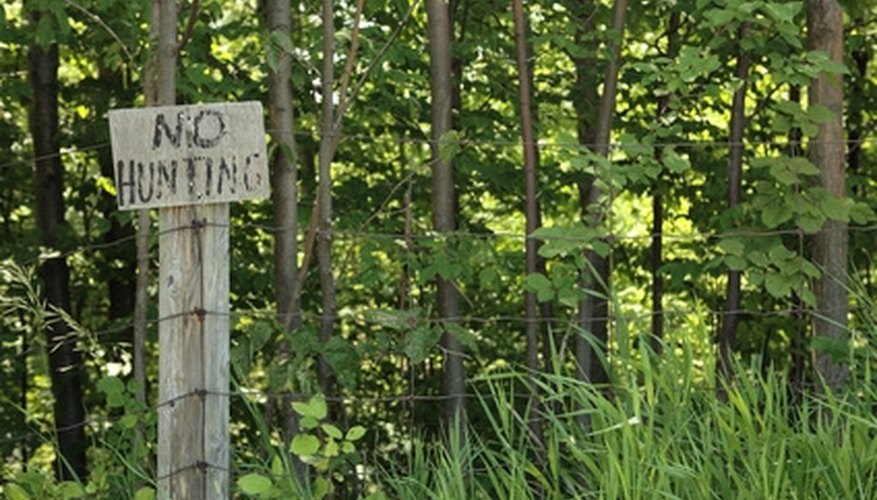 Photo Credit: no hunting image by Inhumane Productions from <a href= Coyote hunters must respect property boundaries.