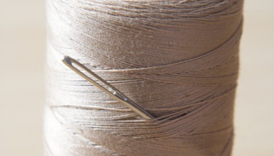 Since you must gather the fabric tightly, use a string that will not break easily.