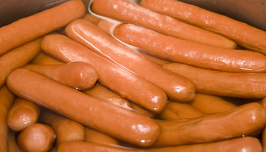 Photo Credit: sausage image by Gabees from <a href='http://www.fotolia.com'>Fotolia.com</a> Using hotdogs works best.