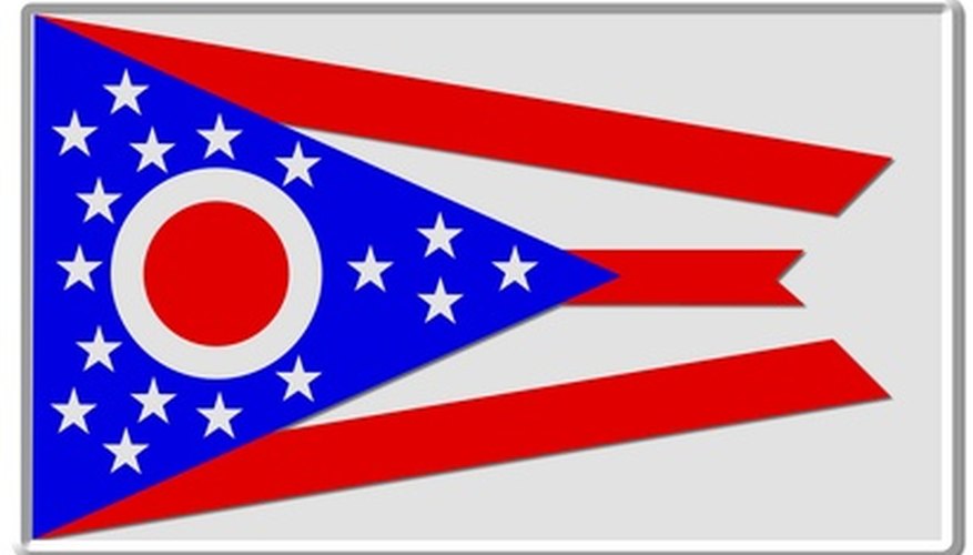 Photo Credit: ohio flagge symbol image by Marty Kropp from <a href='http://www.fotolia.com'>Fotolia.com</a> Hunter education courses are offered in all of Ohio's 88 counties.