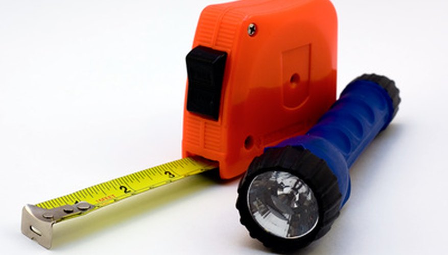 Photo Credit: Measurement image by PhotoMan from <a href='http://www.fotolia.com'>Fotolia.com</a> Use a tape measure to get the correct window treatment size.