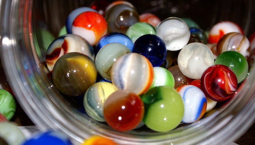 Kumo entails encasing pebbles or marbles into the fabric before dying.