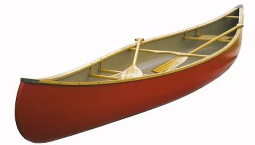 Photo Credit: Comstock/Comstock/Getty Images A canoe is measured from both bow to stern and at the beam to calculate capacity.