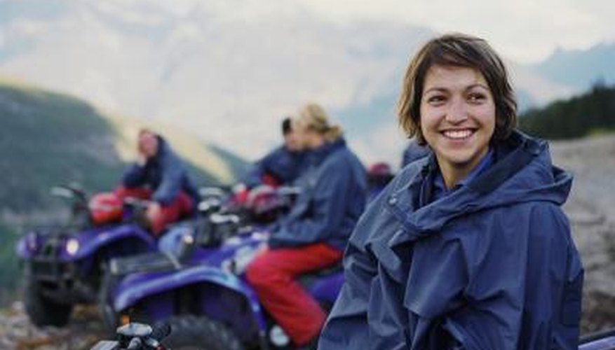 Photo Credit: Mike Powell/Lifesize/Getty Images Friends on ATV trail in mountains