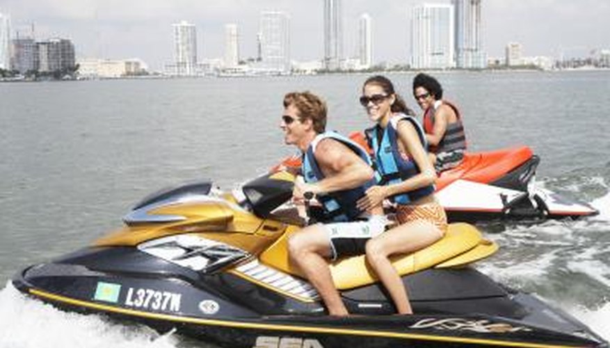 Photo Credit: Jim Arbogast/Digital Vision/Getty Images friends jet skiing at Key Biscayne