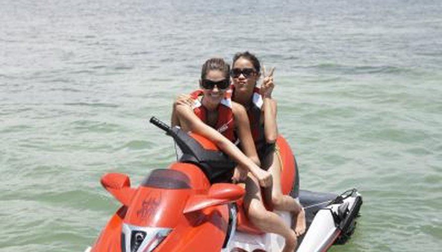 Photo Credit: Jim Arbogast/Photodisc/Getty Images girl friends on jet ski in Tampa Bay