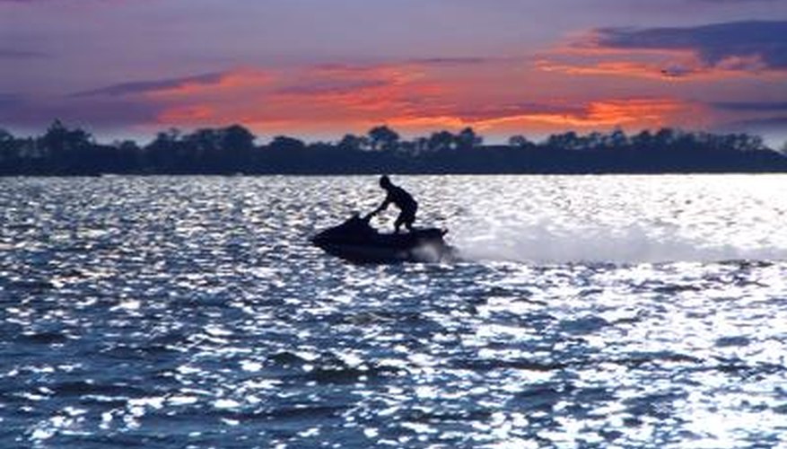 Photo Credit: Elena Elisseeva/Hemera/Getty Images Man riding jed ski in open ocean water