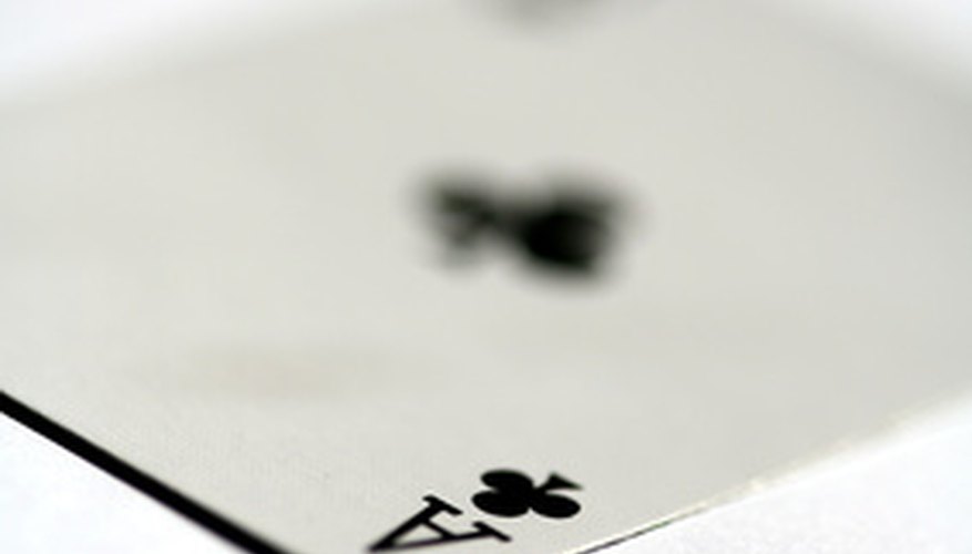 Removing the ink from playing cards doesn't require trick photography.