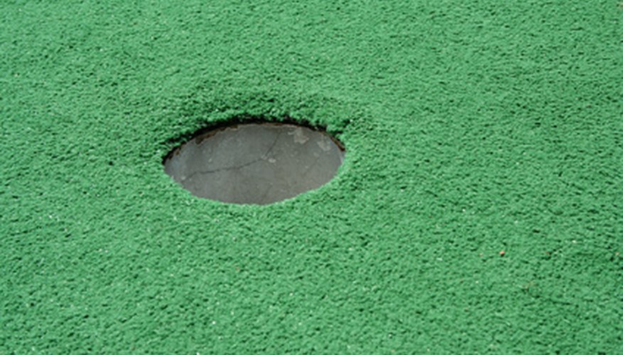 Mini golf is fun for boys and adult leaders alike.