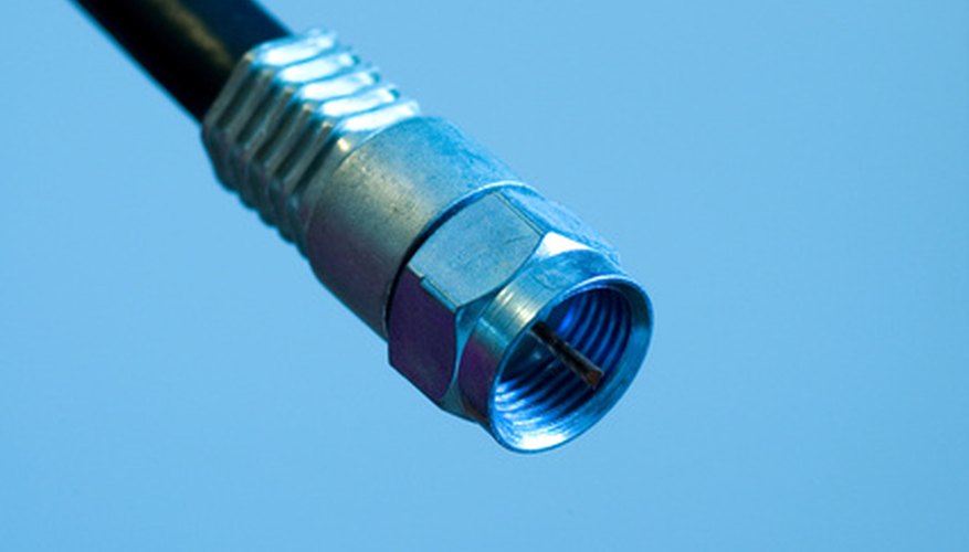 The nut of a F-connector tightens and loosens a cable connection.