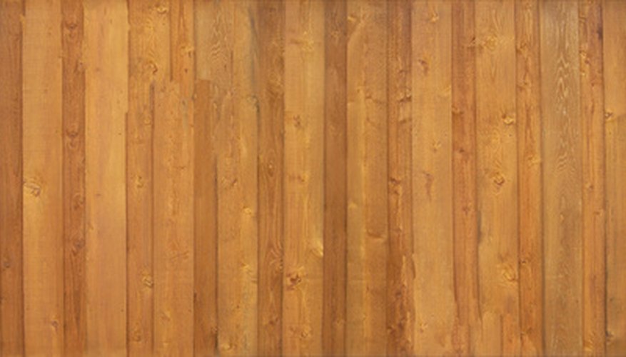 Composite wood fencing looks similar to standard fence but may darken more with age.