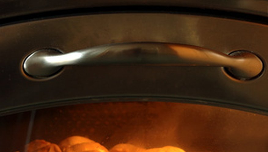 Conventional ovens use heating elements to cook meats.