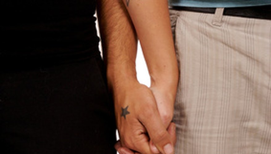 Interlocking fingers is a sign of love.