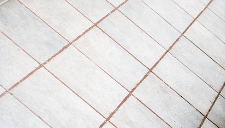Remove urine stains from grout to keep the grout in good condition.