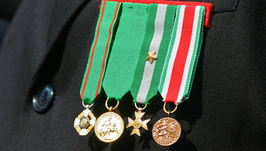 Military medals as displayed on formal wear.