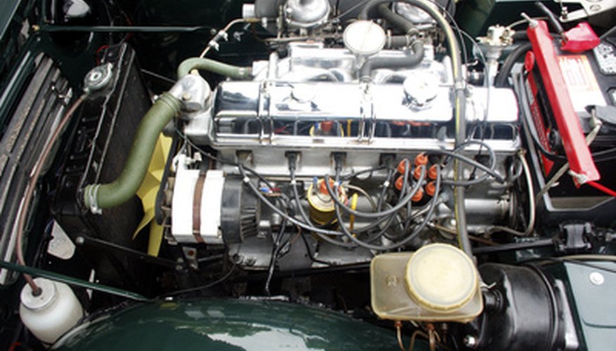 The slave cylinder is under the engine, on top the transmission.