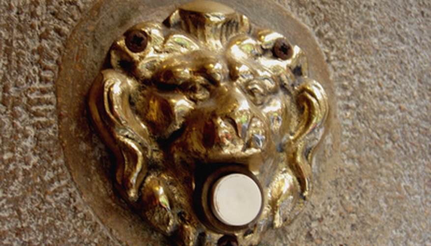 Doorbells are operated by pushing a button near the door of the house.
