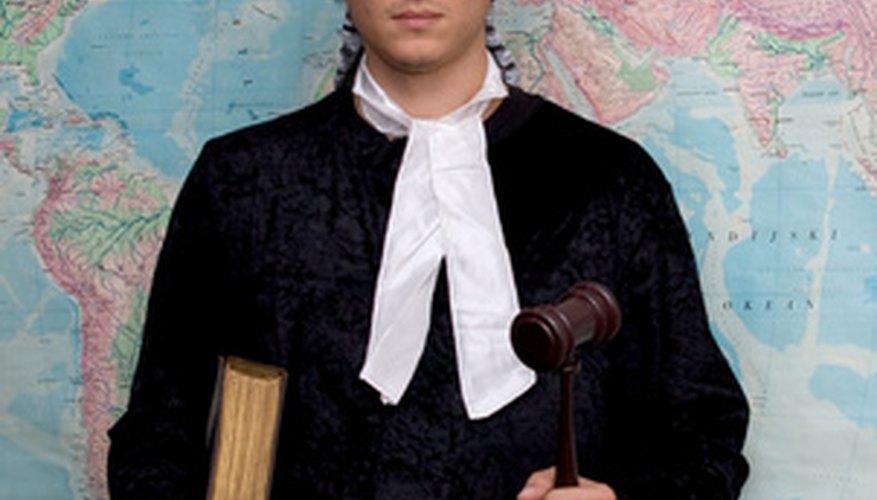 Barristers wear wigs while defending clients during court proceedings.