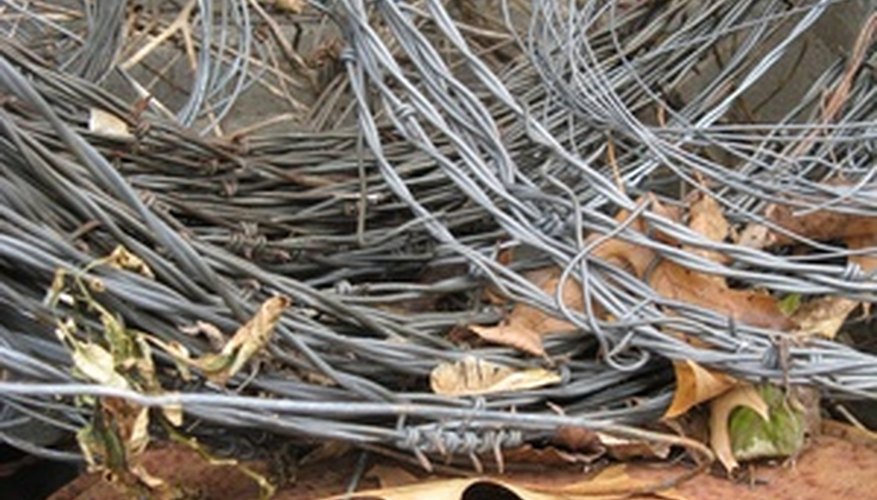 Solder steel wire the same way you solder silver wire.