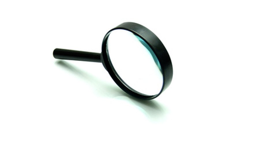 The devil is in the details--a magnifying glass can help you spot the cleverest of fakes.