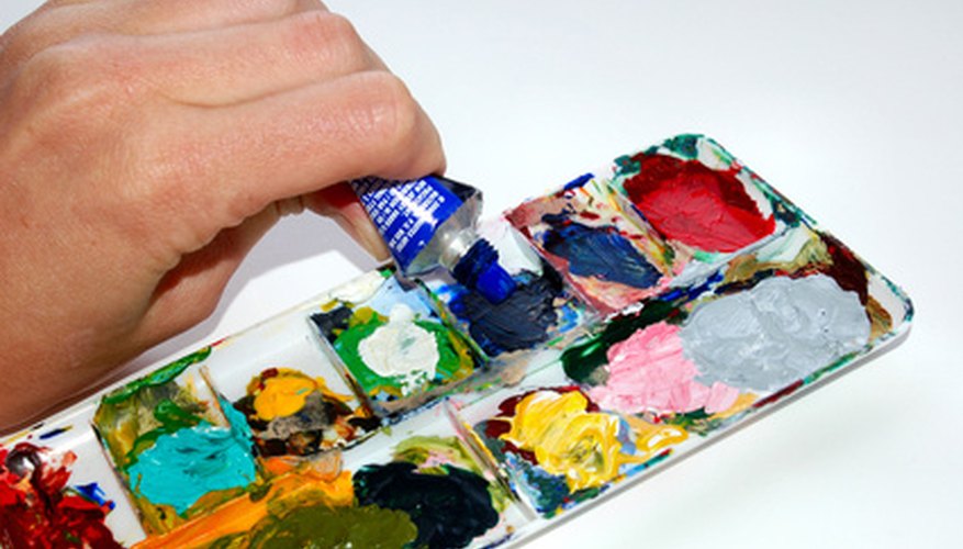 Teaching acrylic painting involves explanation and demonstration.