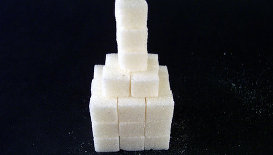 Make sugar cubes stick together with glue or icing.