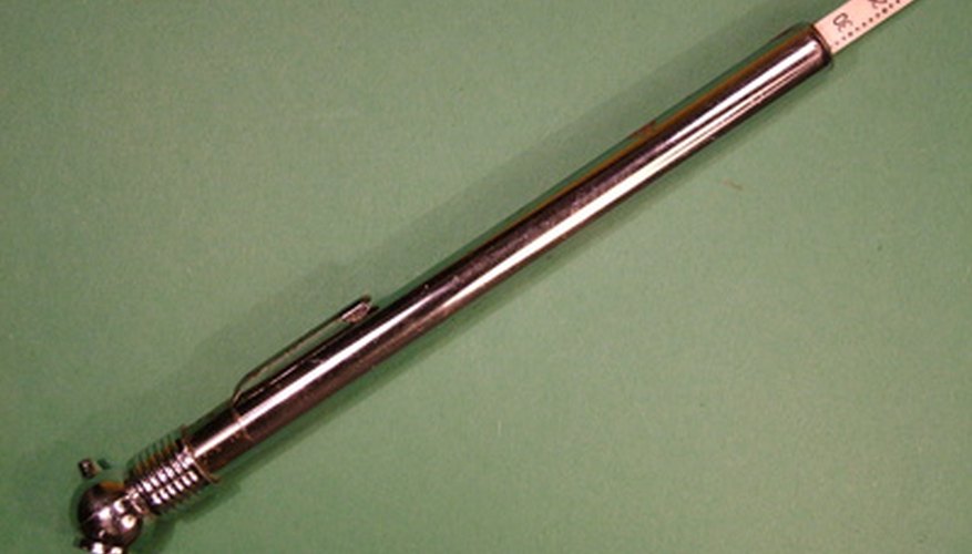 A tire gauge is used to measure the air pressure in the tires.