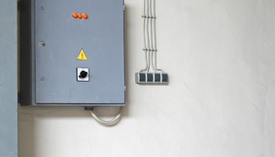 OSHA and NFSA require covers on electrical panels in commercial buildings