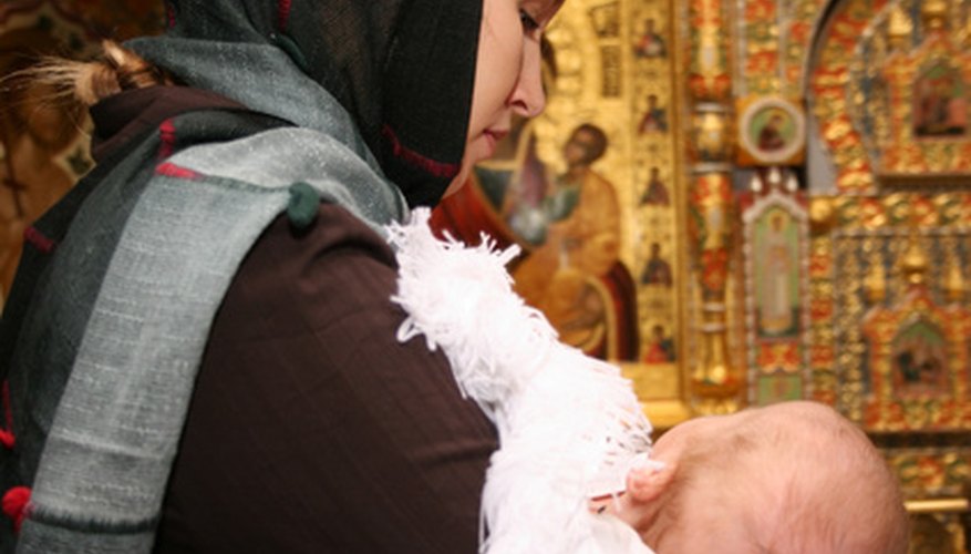 Babies are usually baptised wearing a white dress to symbolise purity.