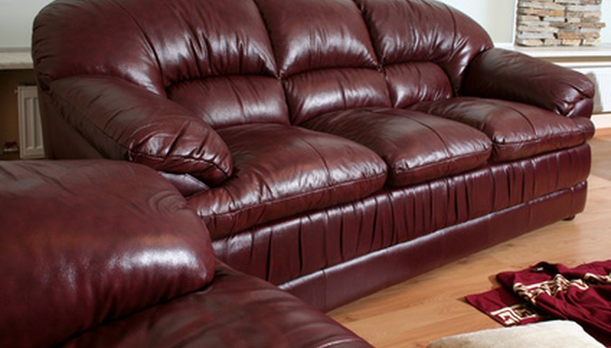 Revitalise an old leather sofa by replacing the cover.