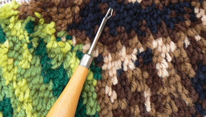 Latch hook a rug or wall hanging using your own patterns.
