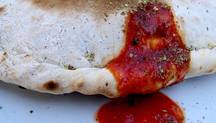 Reheat your calzone in foil to keep the crust crisp.