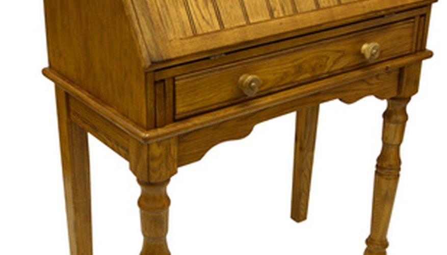 Vintage writing desks typically have a leather top or inlay.