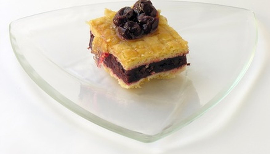 Rehydrate dried cherries for making sweet cherry dessert such as cake.