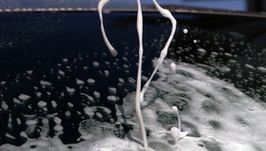 Washing your car helps remove hydraulic fluid from the surface.