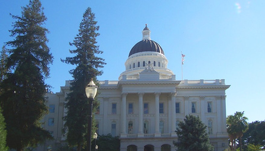 State representatives work at the state capitol building.